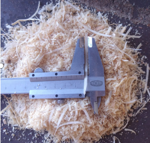 wet sawdust fed into rotary sawdust dryer